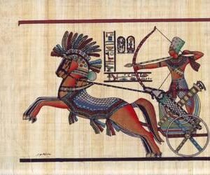 the brave king Ramses ii riding in his chariot and armed with a spear, this view from the battle of Kadesh in Syria