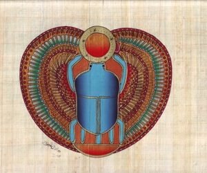 The scarp is a beetle, its colors is charcoal, it depicts here as a shape of the winged sun, which come to existence