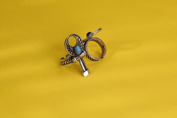 ankh-cross silver ring plated gold, decorated with turquoise gems.